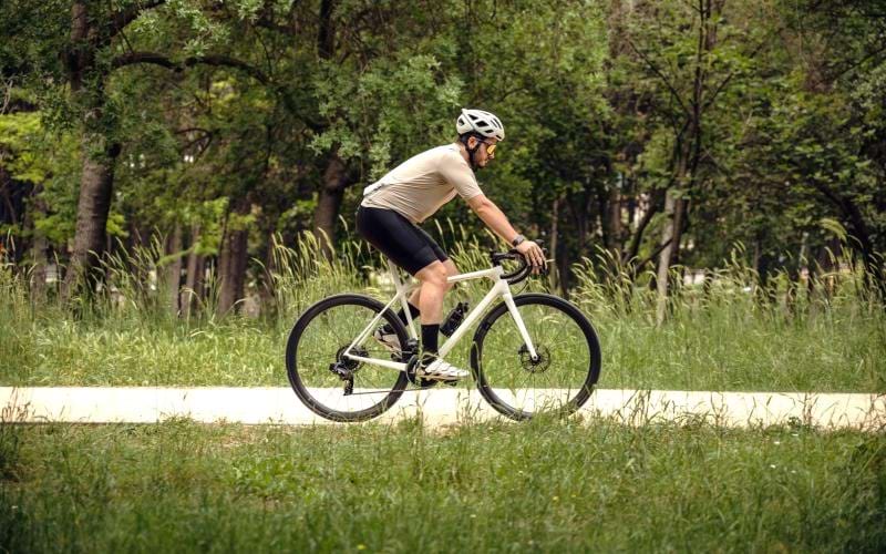 a man riding a bicycle on a track