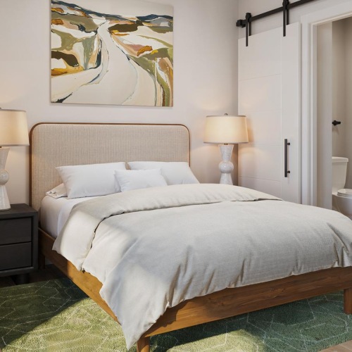 a bedroom with a large bed