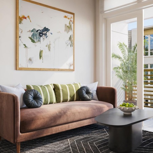 a living room with a couch and coffee table